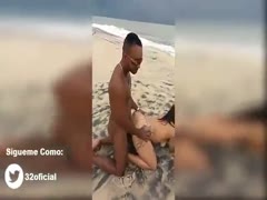 Incredible oral sex recorded behind the tent on the beach
